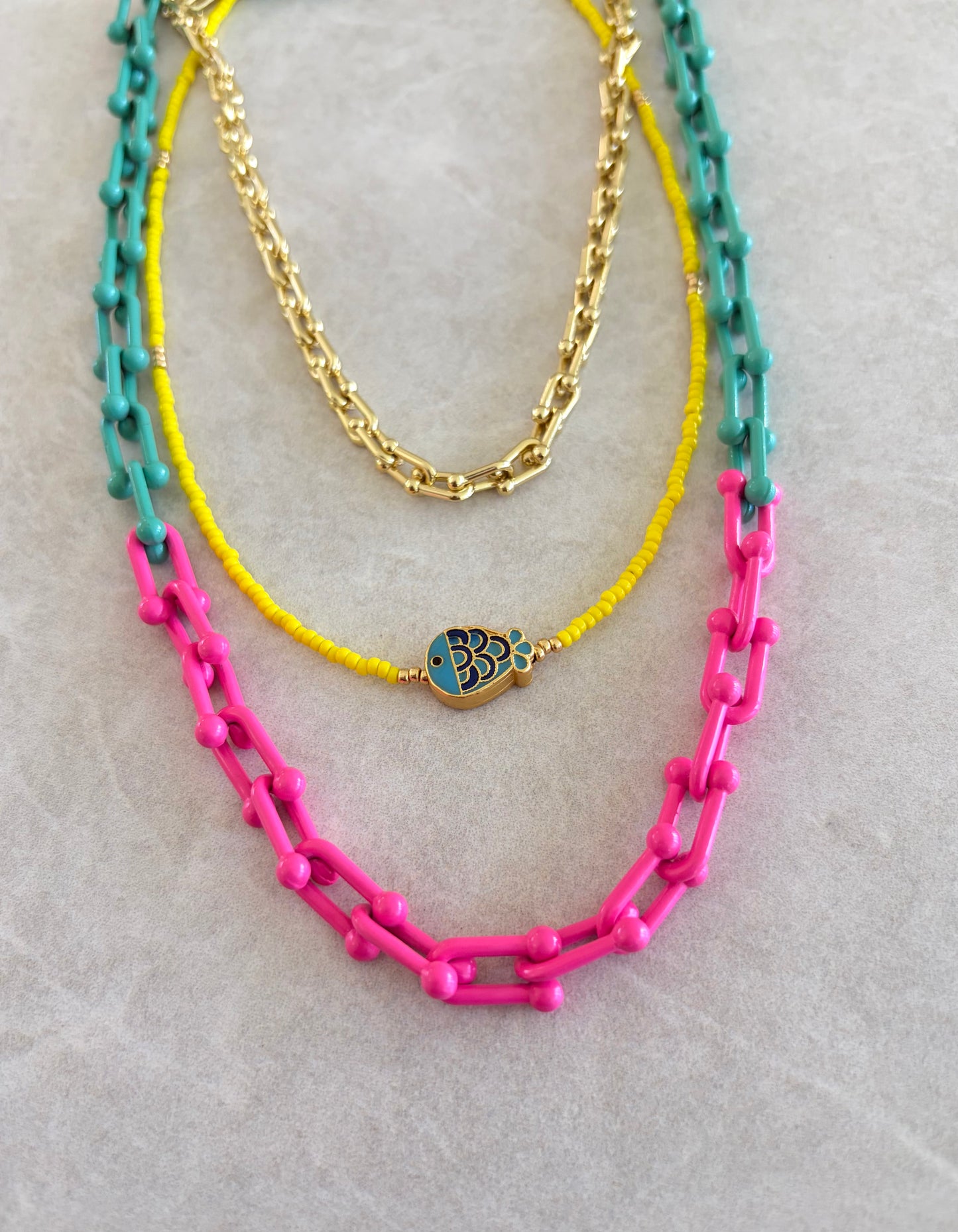 Collar paper clip turquesa y fuschia