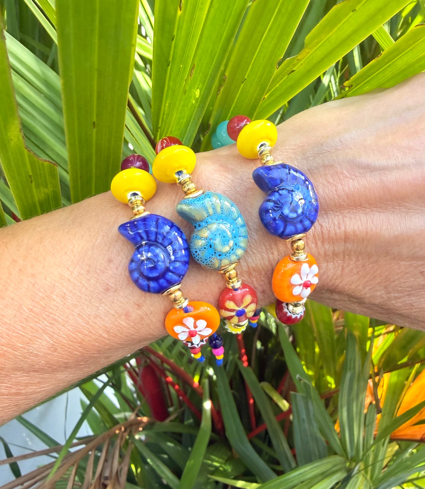 Pulsera caracola marina azul claro
