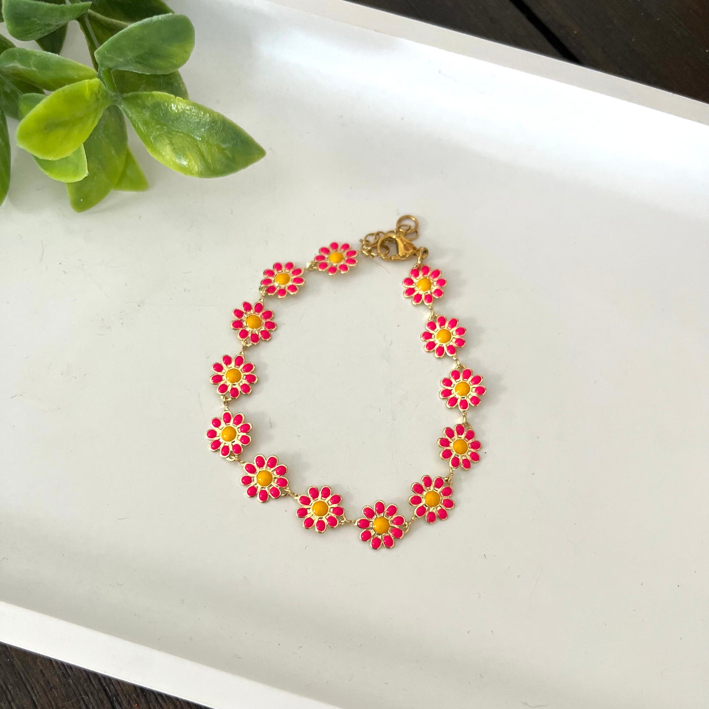 Pulsera margarita fuscia