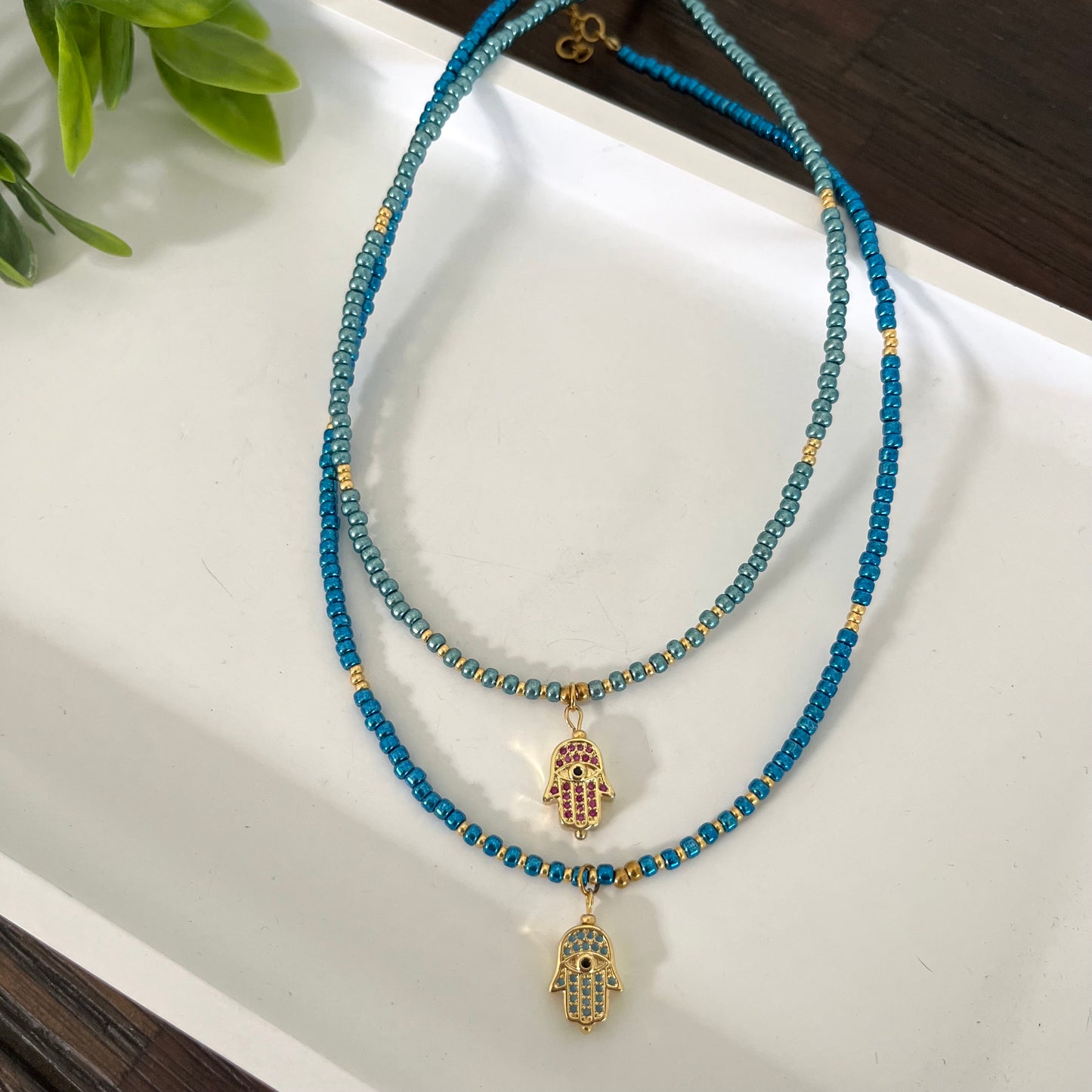 Choker mano hamsa en rhinestone y seed bead