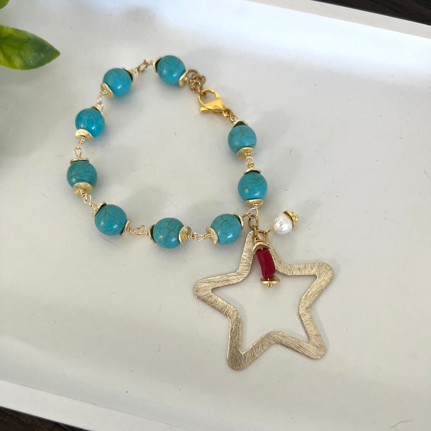 Pulsera turquesa y estrella