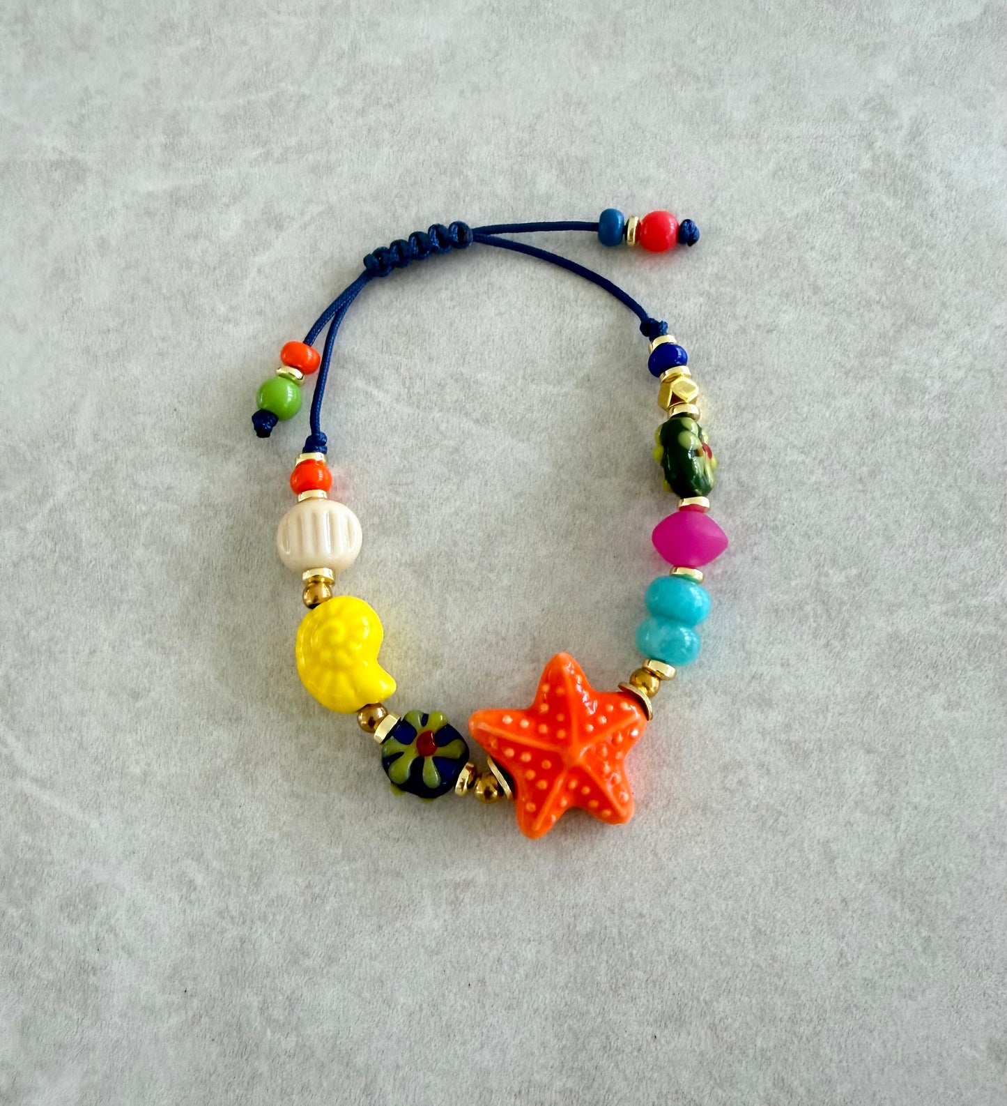 Pulsera estrella de mar naranja