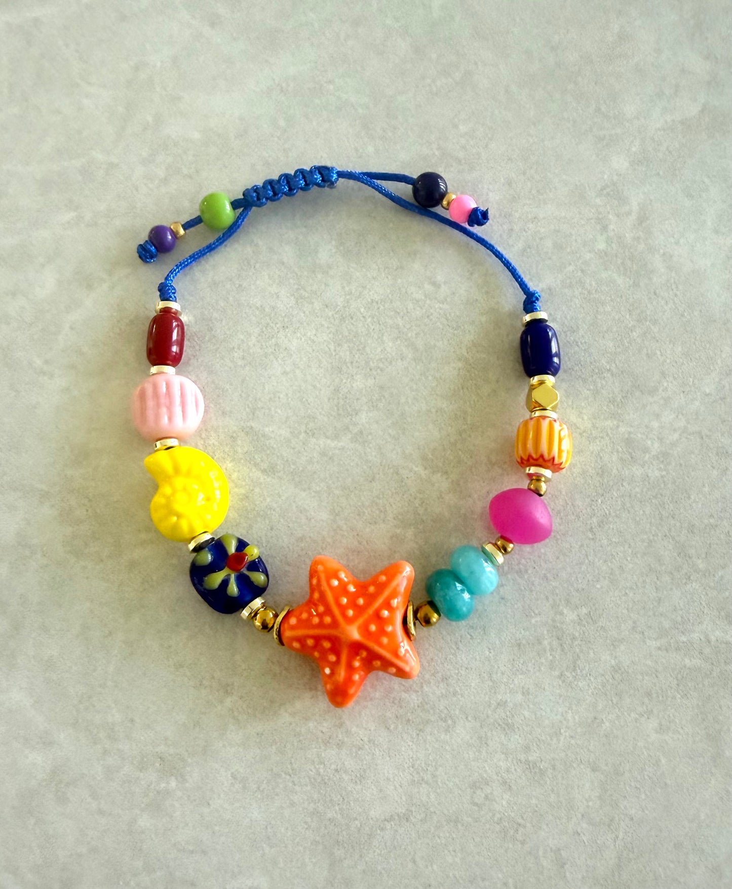 Pulsera estrella de mar naranja