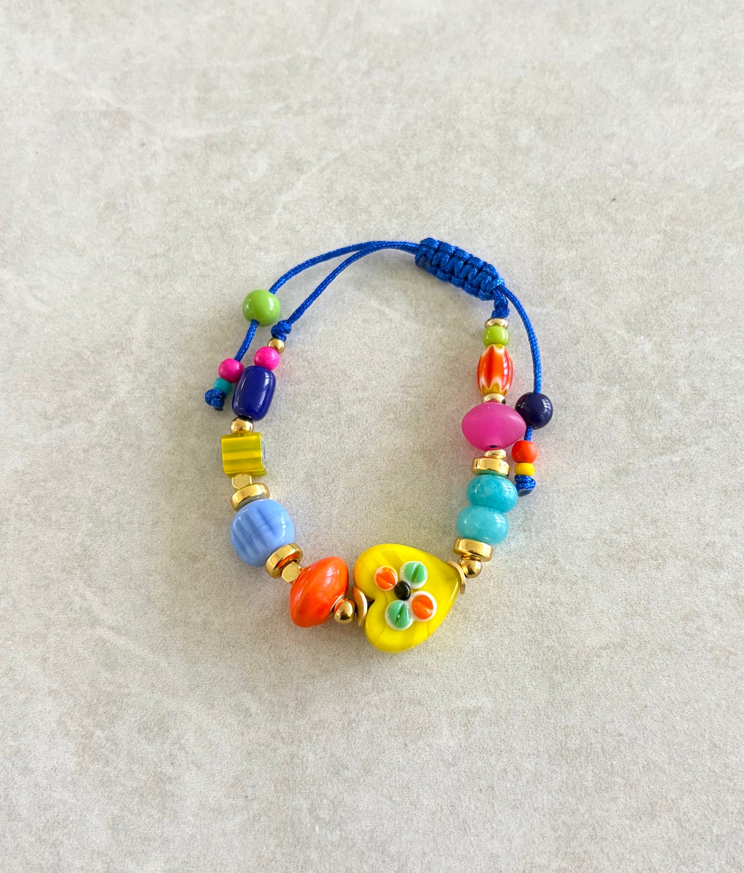 Pulsera corazón amarillo y naranja