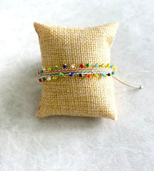 Pulsera hilo beige y seed beads