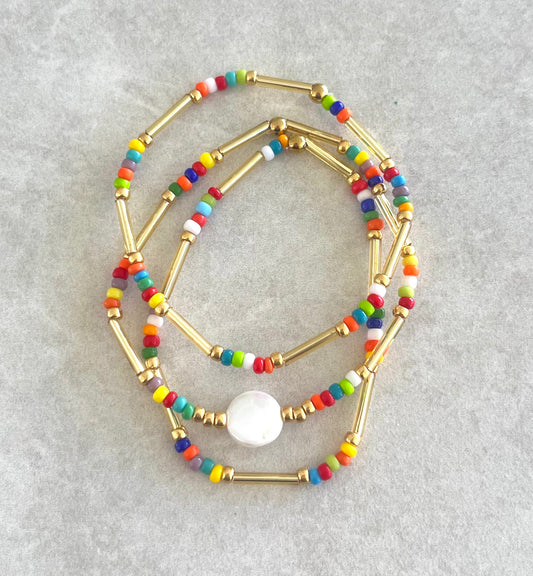 Trio de pulseras dorado II