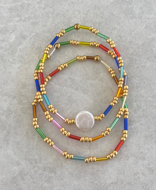 Trio de pulseras multicolor