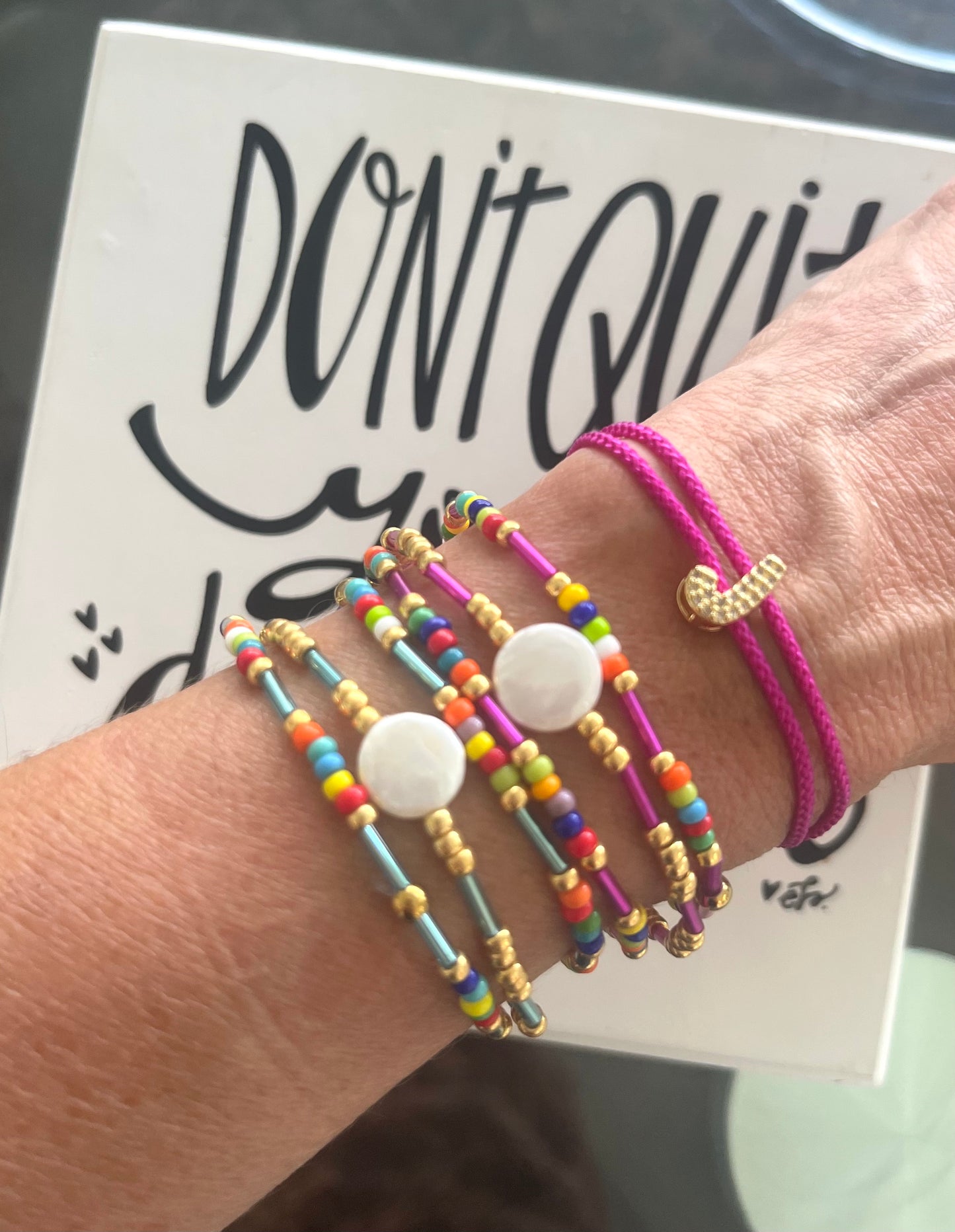 Trio de pulseras color fushia