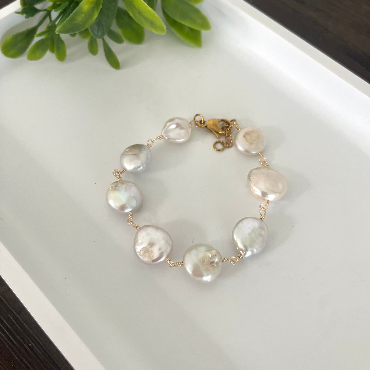 Pulsera perla blanca redonda