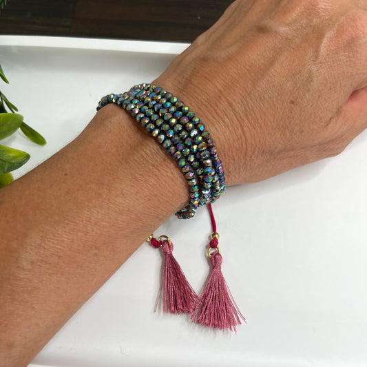 Pulsera cristales y borlas